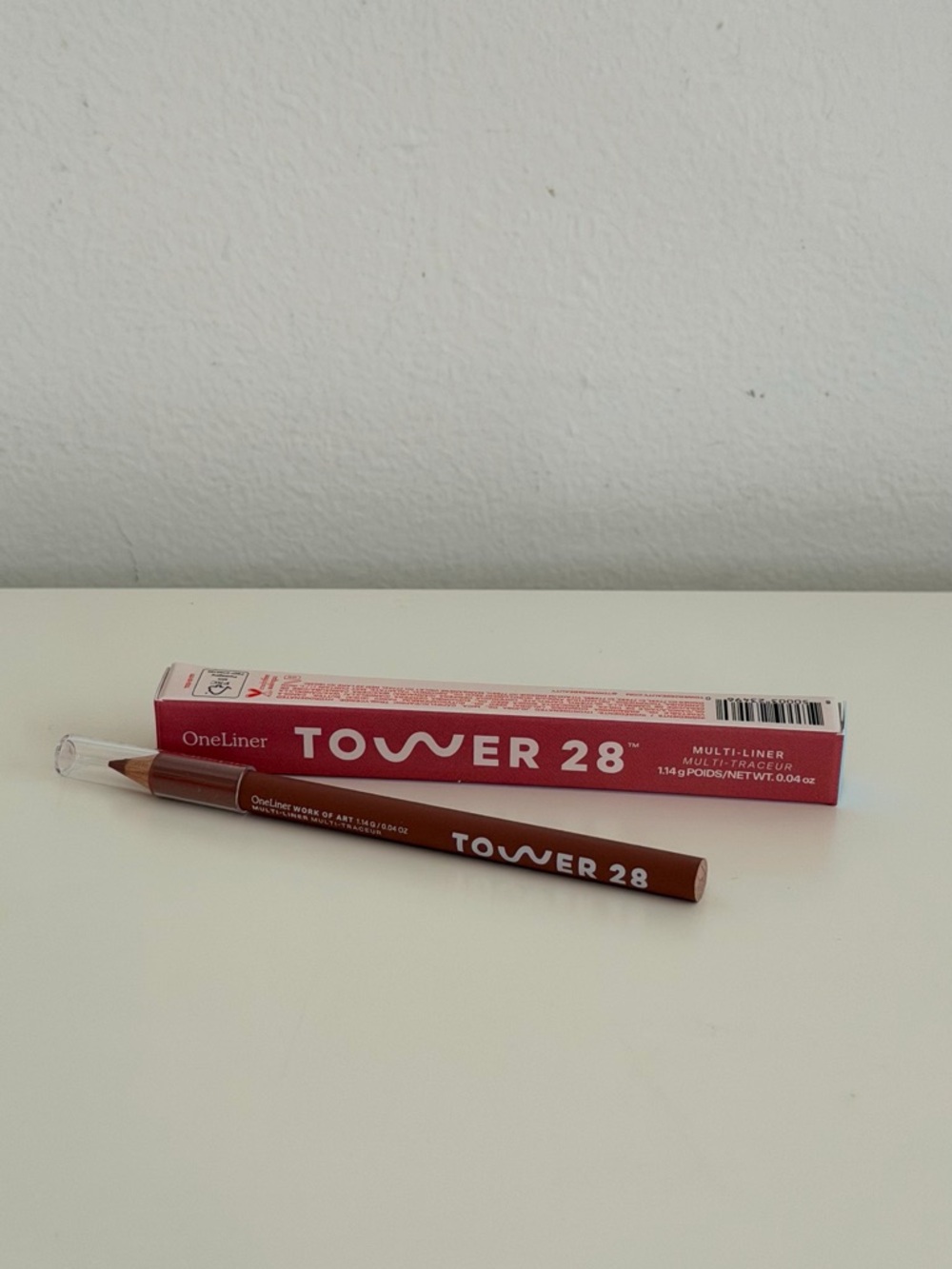 Tower 28 OneLiner Lip Pencil — Warm Brown work of art